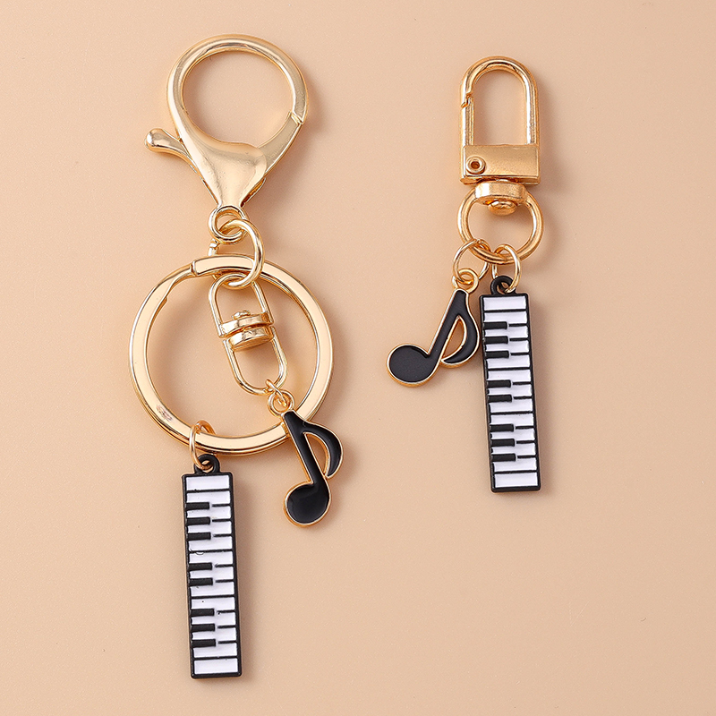 Cute Enamel Mini Piano Keychai - Musical Instrument Tabla บทวิจารณ์และราคา
