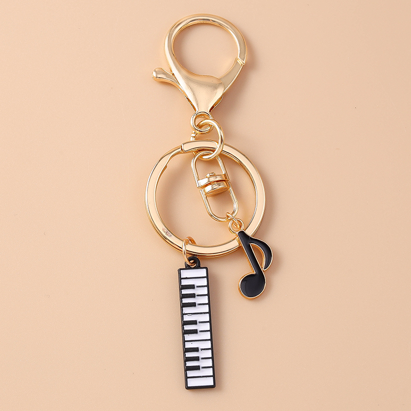Cute Enamel Mini Piano Keychai - Musical Instrument Tabla บทวิจารณ์และราคา