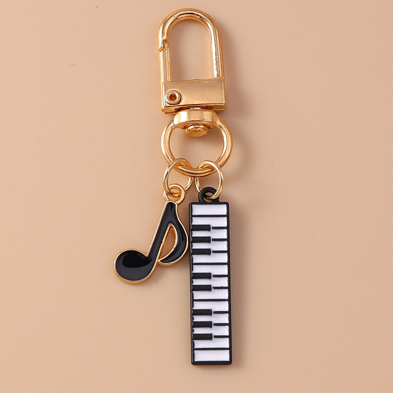 Cute Enamel Mini Piano Keychai - Musical Instrument Tabla บทวิจารณ์และราคา